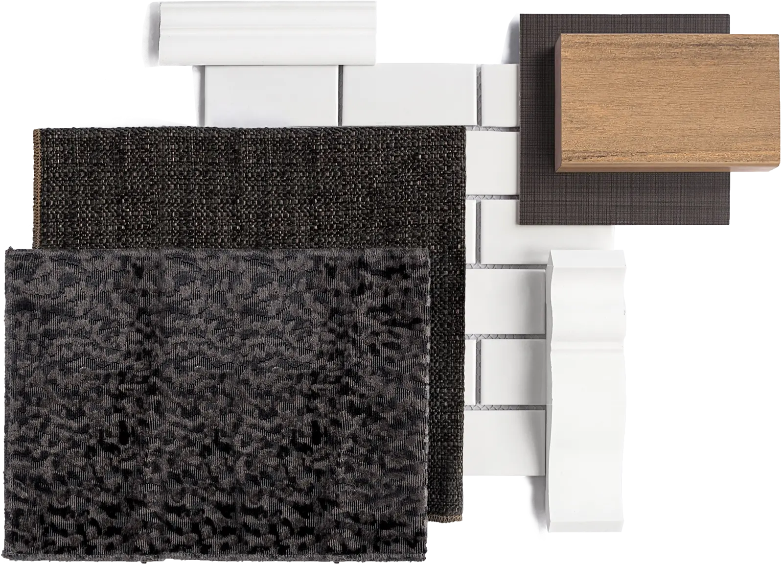 Flat lay of material samples: dark textured textiles, white ceramic tile, painted moulding profiles and a walnut timber block